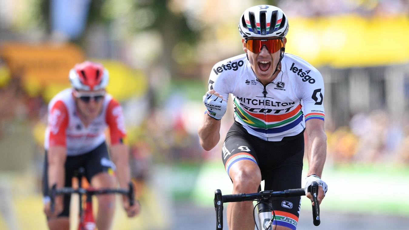 <p>Der Südafrikaner Daryl Impey (r.) jubelt auf dem Weg zur Ziellinie.</p>